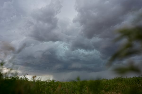 An approaching storm and rain shaft is visible during a Project ICECHIP operation Tuesday, June 3, 2025, near Tipton, Okla. (AP Photo/Carolyn Kaster)