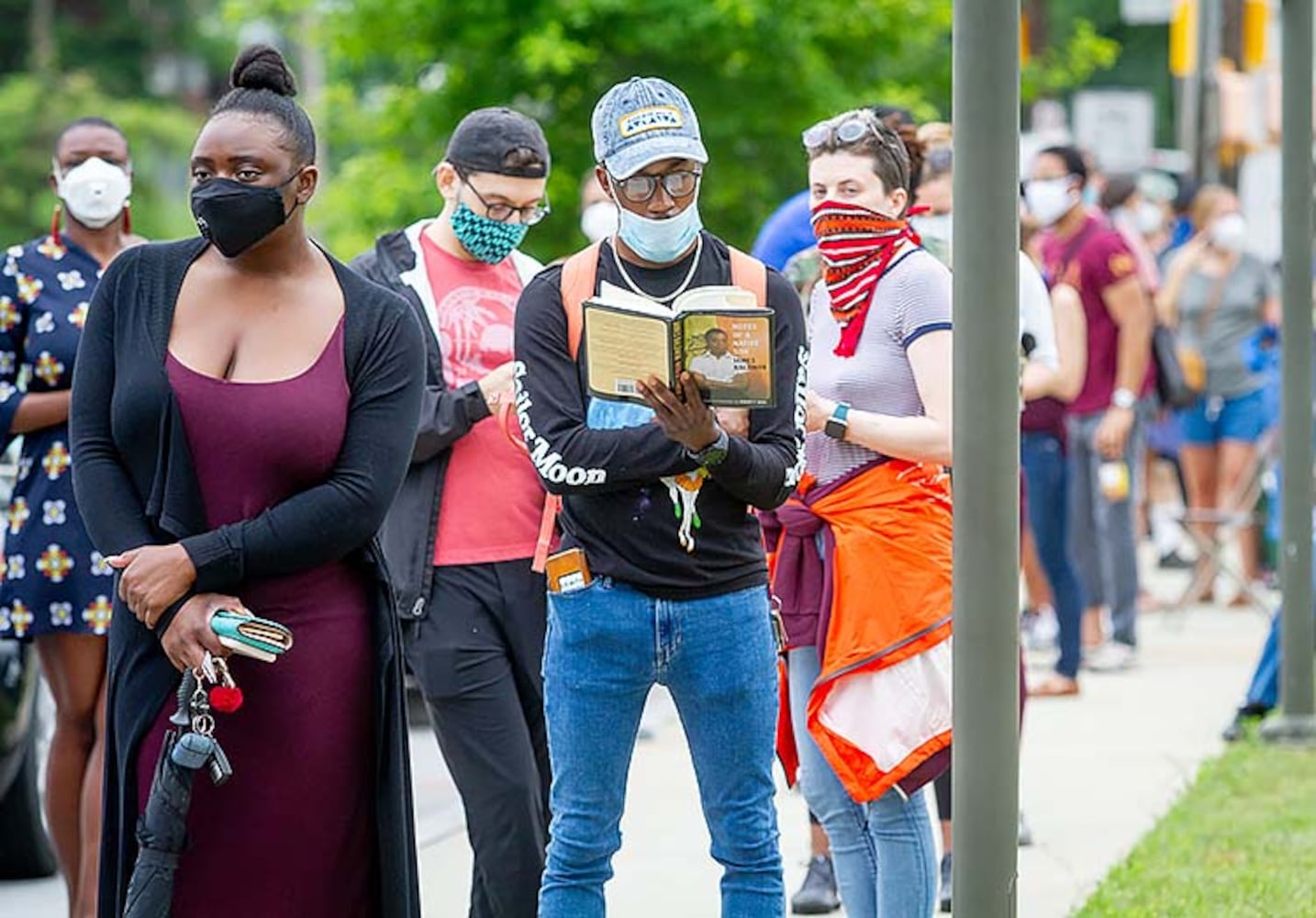 PHOTOS: Georgia voters struggle with long lines, new equipment, social distancing
