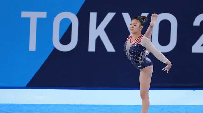 Sunisa Lee of the United States performs her floor routine during the women's all-around gymnastics competition at the postponed 2020 Tokyo Olympics in Tokyo on Thursday, July 29, 2021. She won gold in the event. (Chang W. Lee/The New York Times)