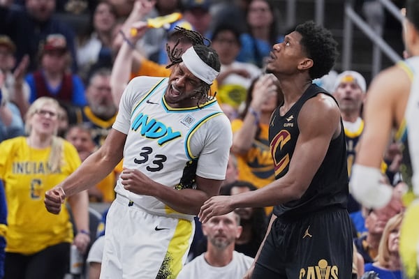 Indiana Pacers center Myles Turner (33) celebrates in the first half of Game 4 against the Cleveland Cavaliers in the Eastern Conference semifinals of the NBA basketball playoffs in Indianapolis, Sunday, May 11, 2025. (AP Photo/Michael Conroy)