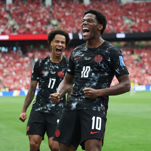 Canada's Jonathan David (10) celebrates after scoring their second goal during the World Cup Group B soccer match between Canada and Qatar in Vancouver, British Columbia, Thursday, June 18, 2026. (AP Photo/Emma Peterson)