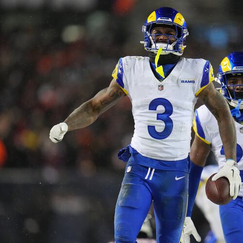 Los Angeles Rams safety Kam Curl (3) reacts with safety Kamren Kinchens (26) after intercepting a pass by Chicago Bears quarterback Caleb Williams, not visible, during overtime of an NFL football divisional playoff game Sunday, Jan. 18, 2026, in Chicago. (AP Photo/Jeff Roberson)