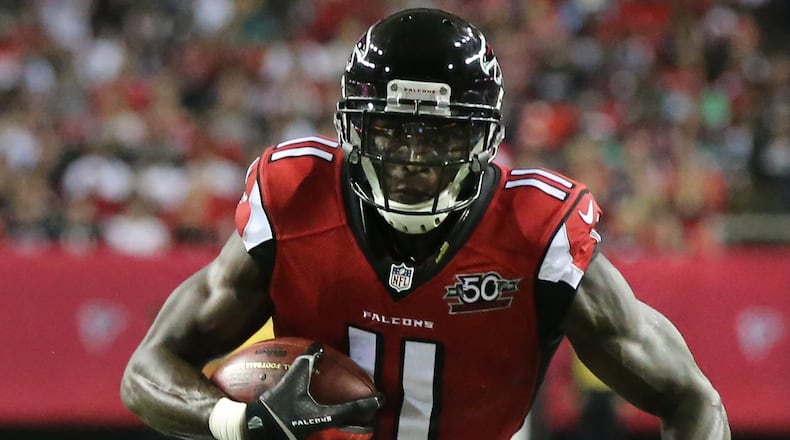 091415 ATLANTA: Falcons wide receiver Julio Jones makes his first of two touchdown receptions against the Eagles during their Monday Night Football game on Monday, Sept. 14, 2015, in Atlanta. Curtis Compton / ccompton@ajc.com