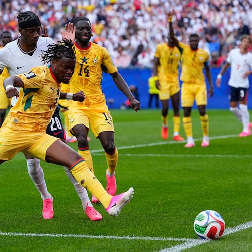 Ghana's Fatawu Issahaku (7) and England's Noni Madueke (20) battle for the ball during the World Cup Group L soccer match between England and Ghana in Foxborough, Mass., near Boston, Tuesday, June 23, 2026. (AP Photo/Petr David Josek)