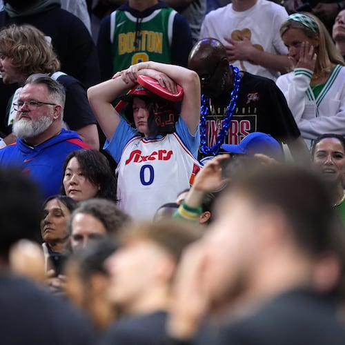 A Philadelphia 76ers' fan reacts during final minute of Game 3 against the Boston Celtics in a first-round NBA playoffs basketball series Friday, April 24, 2026, in Philadelphia. (AP Photo/Matt Slocum)