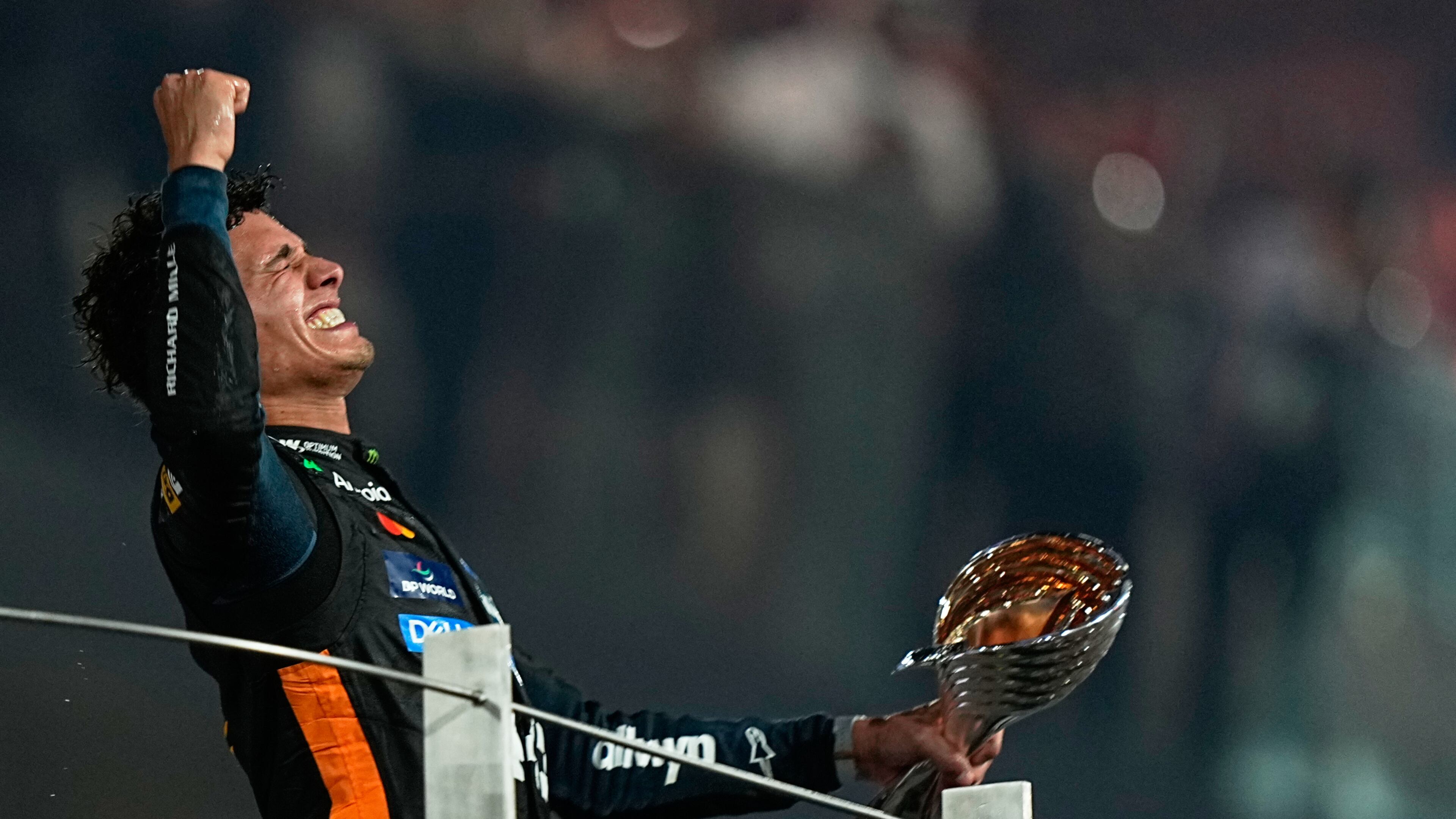 McLaren driver Lando Norris of Britain celebrates after becoming a world champion after the Formula One Abu Dhabi Grand Prix at the Yas Marina Circuit in Abu Dhabi, UAE, Sunday, Dec. 7, 2025. (AP Photo/Fatima Shbair)