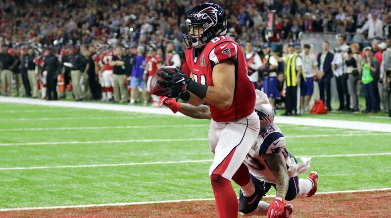 Atlanta Falcons tight end Austin Hooper scores a touchdown in the second quarter as the Atlanta Falcons meet the New England Patriots in Super Bowl LI at NRG Stadium in Houston, TX, Sunday, February 5, 2017. Curtis Compton/AJC