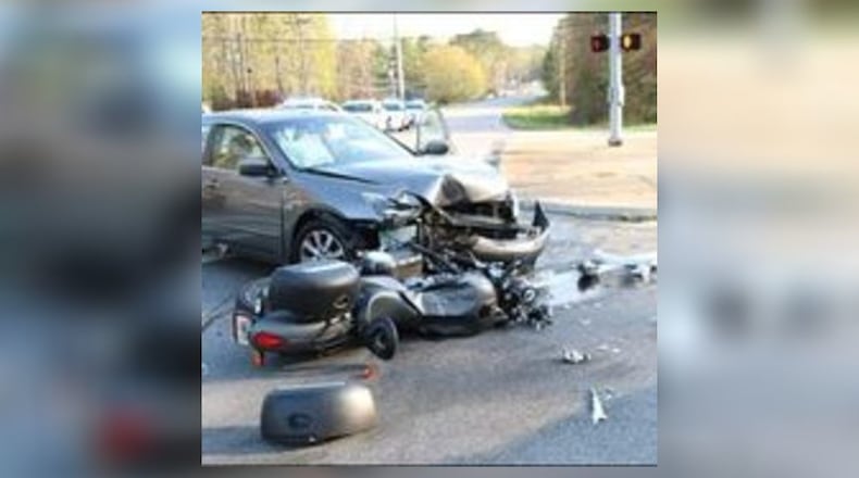 The motorcyclist was heading straight when a Honda Accord tried to make a left turn and hit him, police said.
