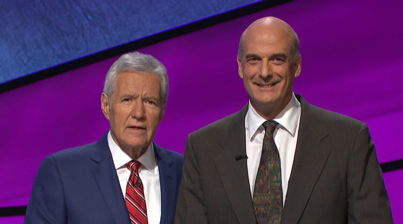 Alan Dunn, a 59-year-old software development manager from Johns Creek, has been watching 'Jeopardy!' since he was a kid. On Friday, he'll appear alongside Alex Trebek and other contestants on the NBC quiz show.