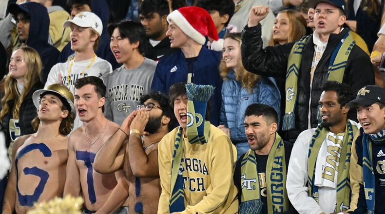 Georgia Tech fans cheer before the start of the Georgia Tech home game against Georgia during an NCAA college football game at Georgia Tech's Bobby Dodd Stadium, Saturday, November 25, 2023, in Atlanta. Georgia won 31-23 over Georgia Tech. (Hyosub Shin / Hyosub.Shin@ajc.com)