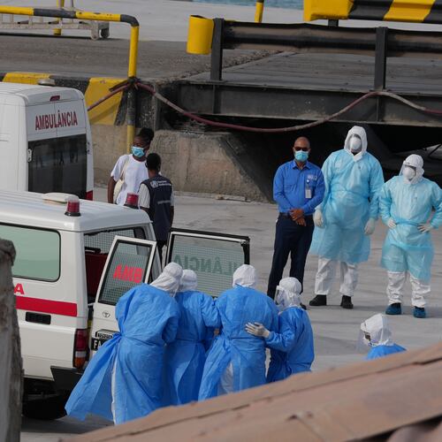 Health workers in protective gear evacuate patients from the MV Hondius cruise ship into an ambulance at a port in Praia, Cape Verde, Wednesday, May 6, 2026. (AP Photo/Misper Apawu)
