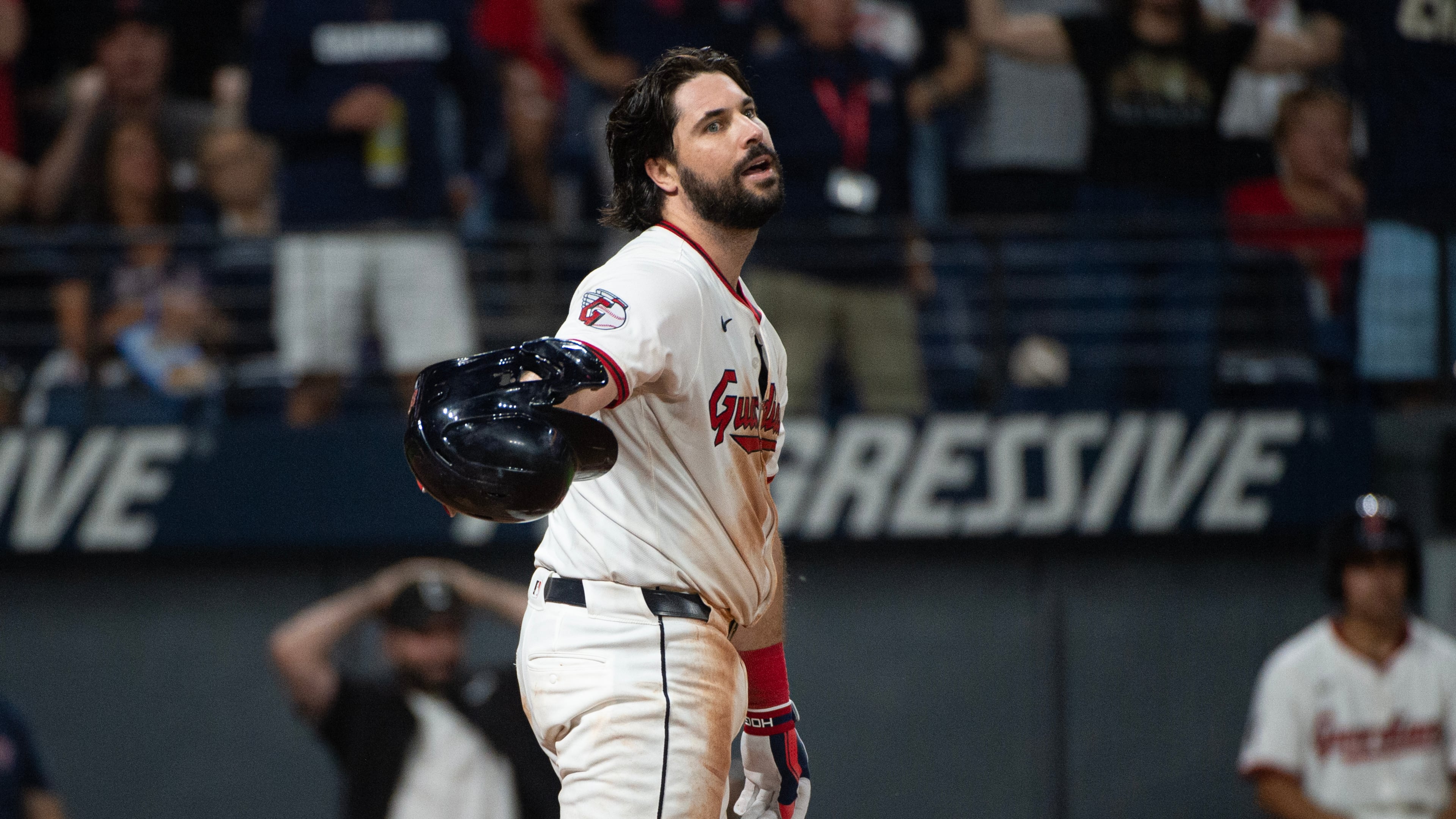 Cleveland Guardians' Austin Hedges reacts after being called out on strikes from Texas Rangers starting pitcher Jacob Latz to end the fifth inning of a baseball game, Saturday, Sept. 27, 2025, in Cleveland. (AP Photo/Phil Long)