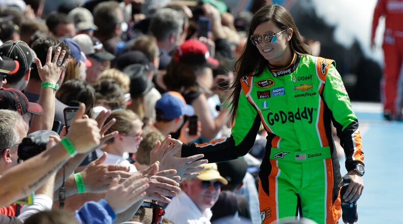 Danica Patrick greets her people before the start of a Daytona 500. (AP Photo/John Raoux)