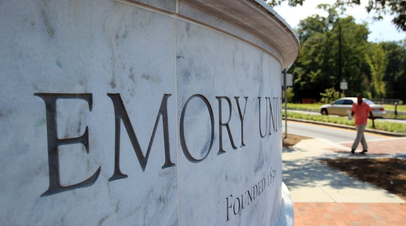 The Emory University sign is shown along North Decatur Road at the main entrance to Druid Hills campus. AJC FILE PHOTO.