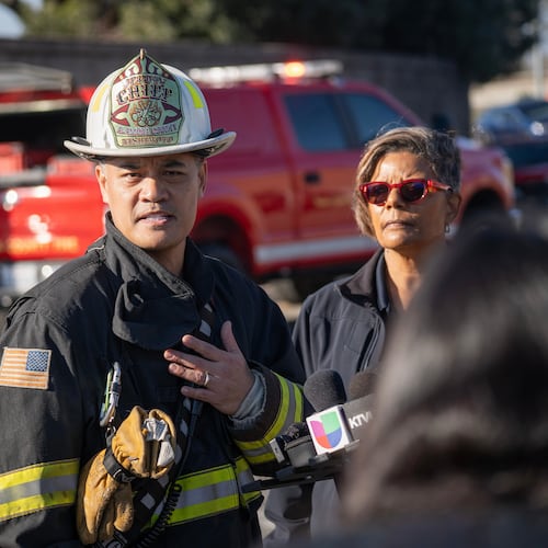 Alameda County Fire Deputy Chief Ryan Nishimoto addresses the media at the site of a gas explosion on the 800 block of East Lewelling Boulevard, Thursday, Dec. 11, 2025, in Hayward, Calif. (AP Photo/Minh Connors)