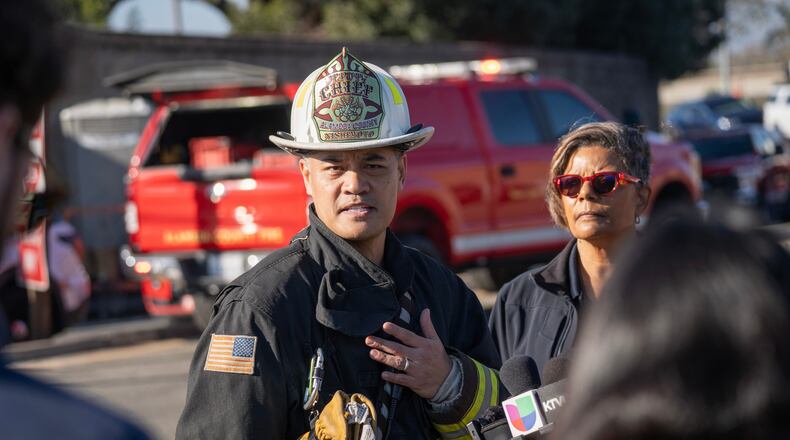 Alameda County Fire Deputy Chief Ryan Nishimoto addresses the media at the site of a gas explosion on the 800 block of East Lewelling Boulevard, Thursday, Dec. 11, 2025, in Hayward, Calif. (AP Photo/Minh Connors)