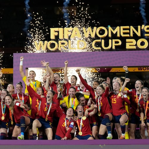 FILE - Team Spain celebrates with the trophy after winning the Women's World Cup soccer final against England at Stadium Australia in Sydney, Australia, August 20, 2023. (AP Photo/Alessandra Tarantino, File)