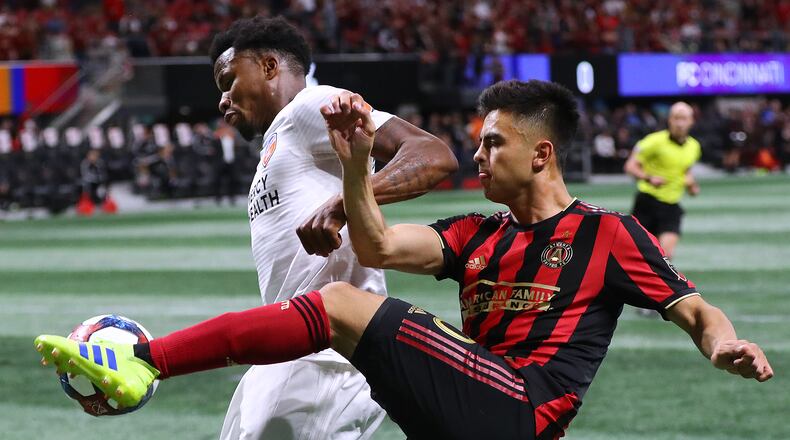 March 10, 2019 Atlanta: Atlanta United midfielder Pity Martinez is blocked out by FC Cincinnati defender Alvas Powell in front of the goal during the second half in their MLS soccer match on Sunday, March 10, 2019, in Atlanta.    Curtis Compton/ccompton@ajc.com