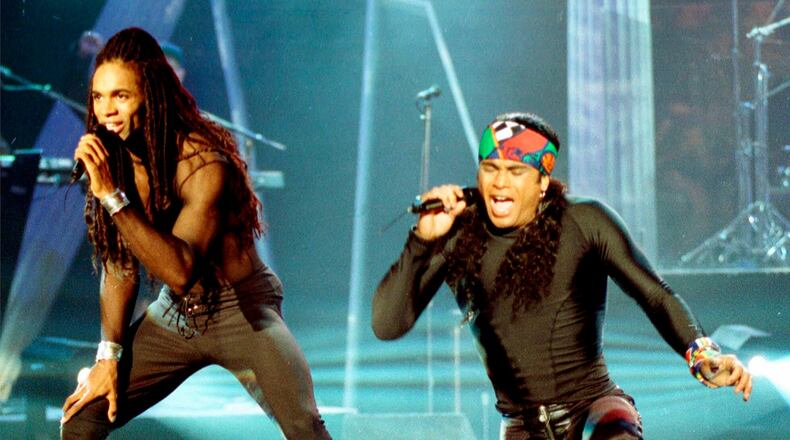 FILE - In this Oct. 26, 1992 file photo, Fabrice Morvan, left, and Rob Pilatus of Milli Vanilli perform during the taping of the Arsenio Hall Show in Los Angeles. (AP Photo/Craig Fujii, File)