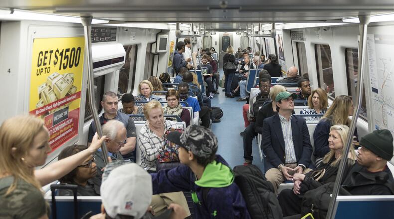 Passengers ride the Red Line train at the North Springs MARTA Station. Since the I-85 bridge fire Thursday, there will be plenty of new MARTA riders, as commuters try to find new ways to get to work and elsewhere. DAVID BARNES / DAVID.BARNES@AJC.COM