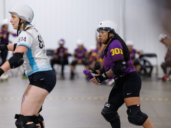 Donita Green (right), also known as Blaxyl Rose, skates during the playoffs in Columbia, South Carolina. (Courtesy of Ethan Trewhitt)