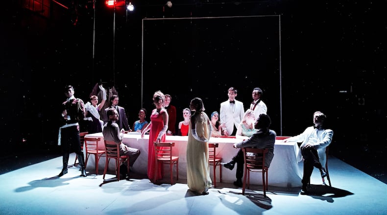 Surreal happens: Members of the large ensemble pull up seats in the avant-garde theater work based upon Luis Buñuel’s film.