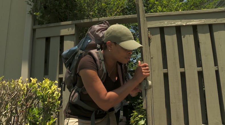 Angela Brinson of Douglasville trying to escape hunters in "Hunted" on CBS.