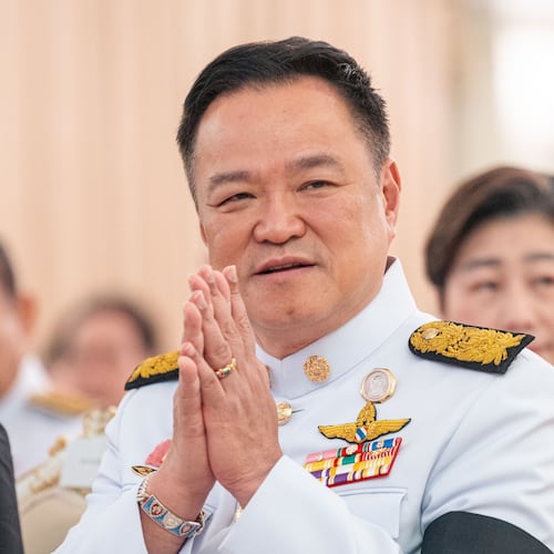 Thailand's Prime Minister Anutin Charnvirakul gestures as he attends an event at the government house in Bangkok, Thailand, Friday, Dec. 12, 2025. (AP Photo/Arnun Chonmahatrakool)