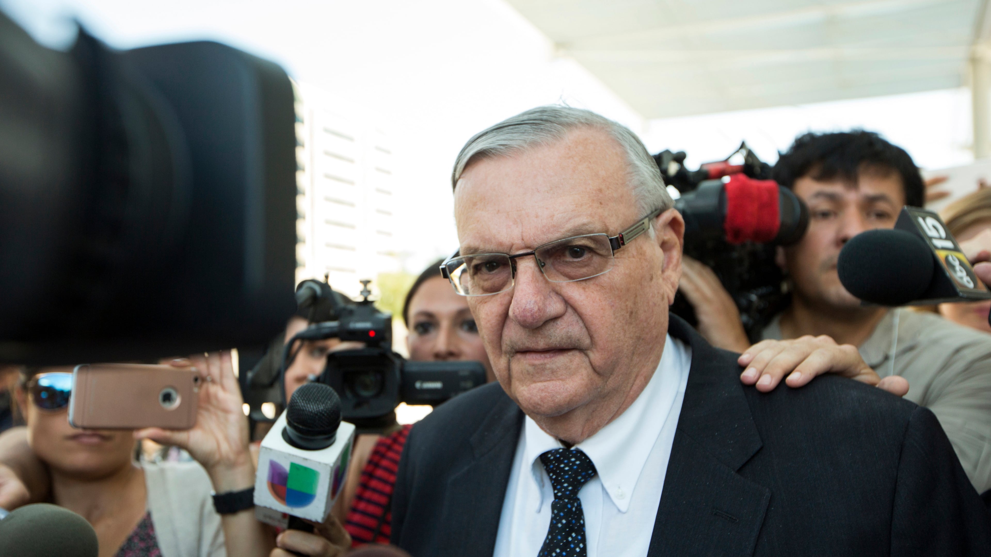 FILE - Former Sheriff Joe Arpaio leaves the federal courthouse in Phoenix, July 6, 2017. (AP Photo/Angie Wang, File)