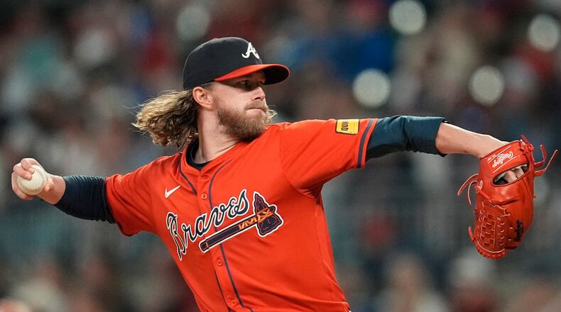 Atlanta Braves pitcher Pierce Johnson (38) delivers during the eighth inning of a baseball game against the Cleveland Guardians, Friday, April 26, 2024, in Atlanta. (AP Photo/Mike Stewart)