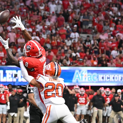 Georgia wide receiver Colbie Young (8) is not able to catch under pressure from Clemson cornerback Avieon Terrell (20) during the first half in an NCAA football game at Mercedes-Benz Stadium, Saturday, August 31, 2024, in Atlanta. (Hyosub Shin/AJC)