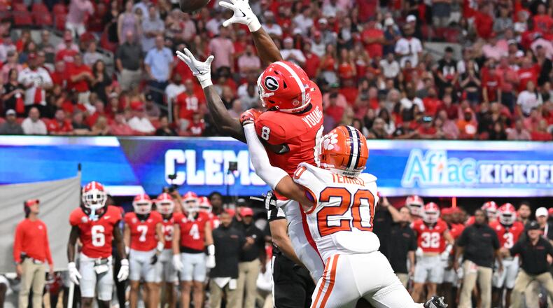 Georgia wide receiver Colbie Young (8) is not able to catch under pressure from Clemson cornerback Avieon Terrell (20) during the first half in an NCAA football game at Mercedes-Benz Stadium, Saturday, August 31, 2024, in Atlanta. (Hyosub Shin/AJC)