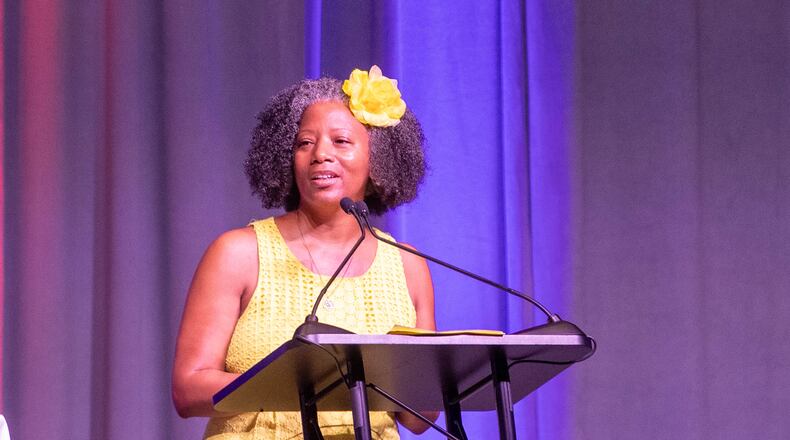 Gwinnett County school board member Tarece Johnson-Morgan speaks at new teacher orientation in Duluth on July 11, 2023. Johnson-Morgan said she feels her voice is not valued by the majority of the board, leaving her out of decision-making. (Katelyn Myrick/katelyn.myrick@ajc.com)