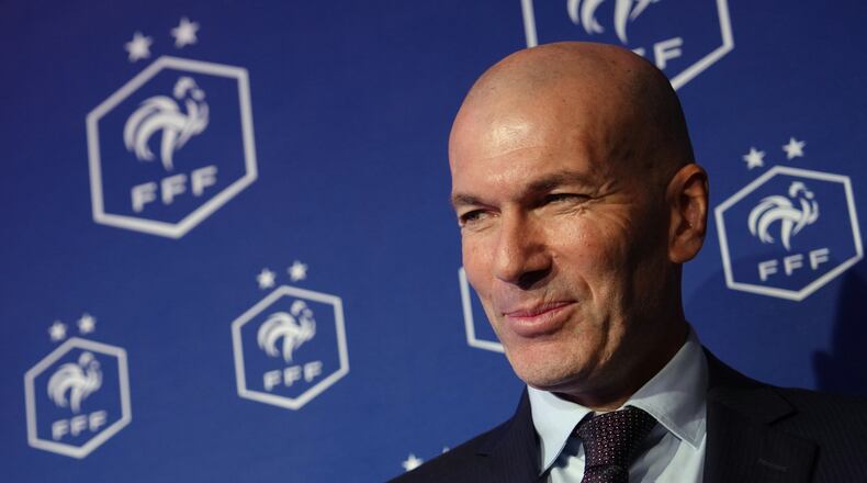 Zinedine Zidane, newly appointed coach of the France national soccer team, attends a media conference at the headquarters of French Football Federation headquarters in Paris, Tuesday, July 28, 2026. (AP Photo/Aurelien Morissard)