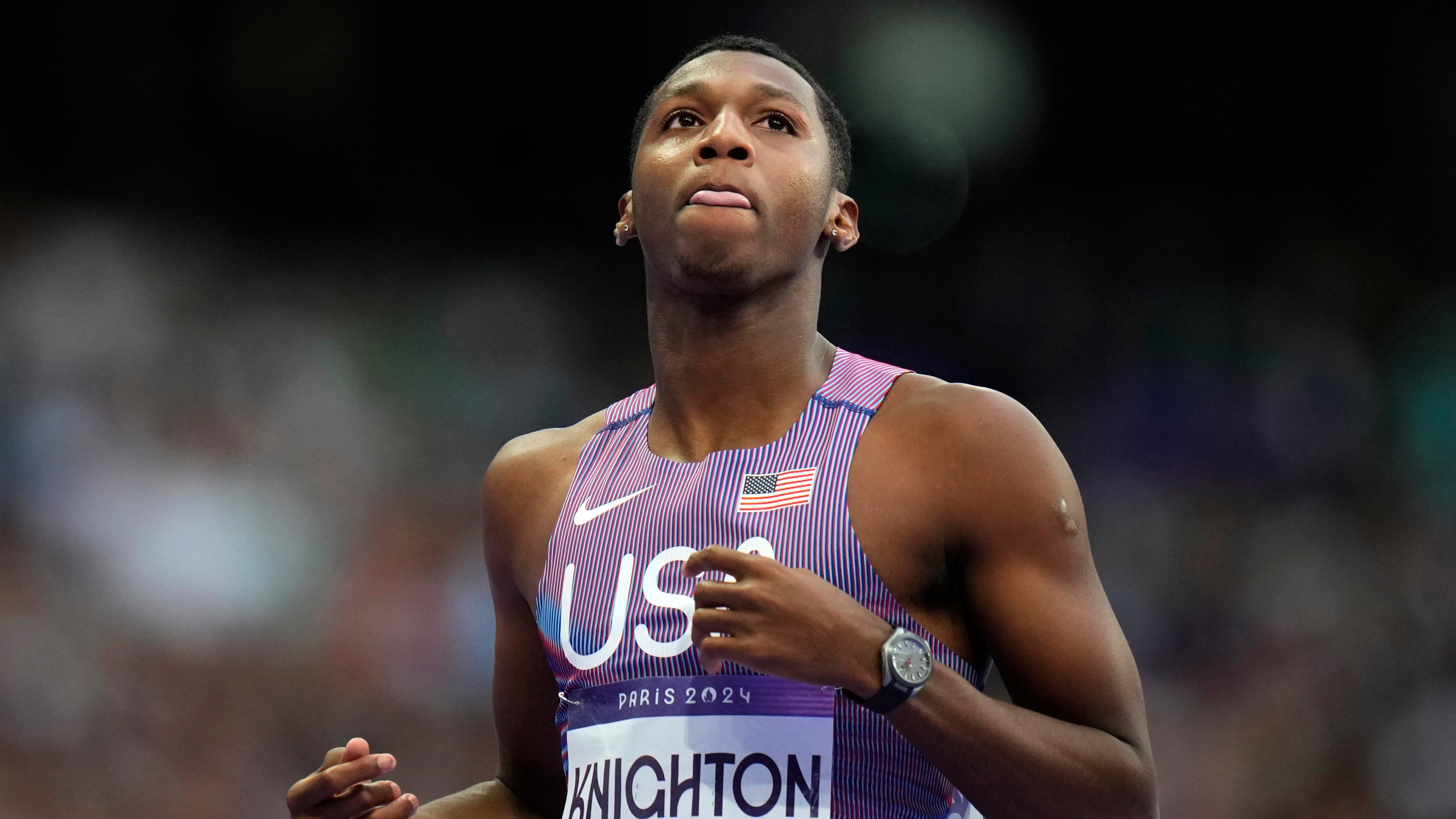 FILE - Erriyon Knighton, of the United States, reacts following his men's 200-meter semifinal at the 2024 Summer Olympics, on Aug. 7, 2024, in Saint-Denis, France. (AP Photo/Petr David Josek, File)