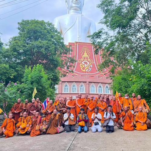 This photograph released by the Phu Manorom temple shows a group of Thai Buddhist monk posing for a picture at Phu Manorom temple in Mukdahan province, Thailand, Thursday, July 2, 2026 (Phu Manorom temple via AP)