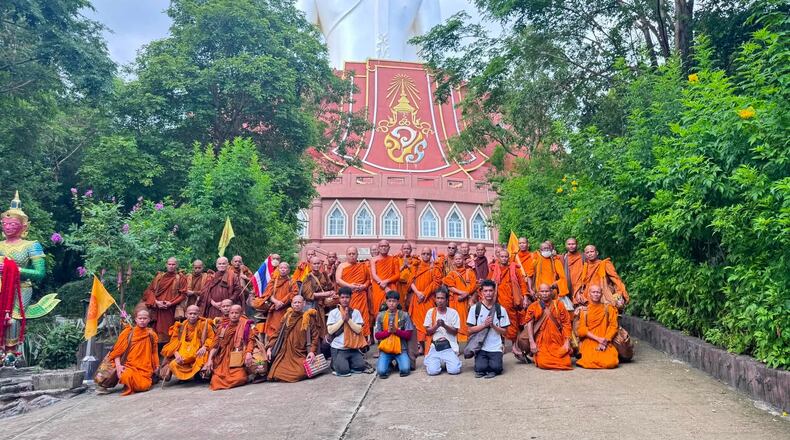 This photograph released by the Phu Manorom temple shows a group of Thai Buddhist monk posing for a picture at Phu Manorom temple in Mukdahan province, Thailand, Thursday, July 2, 2026 (Phu Manorom temple via AP)