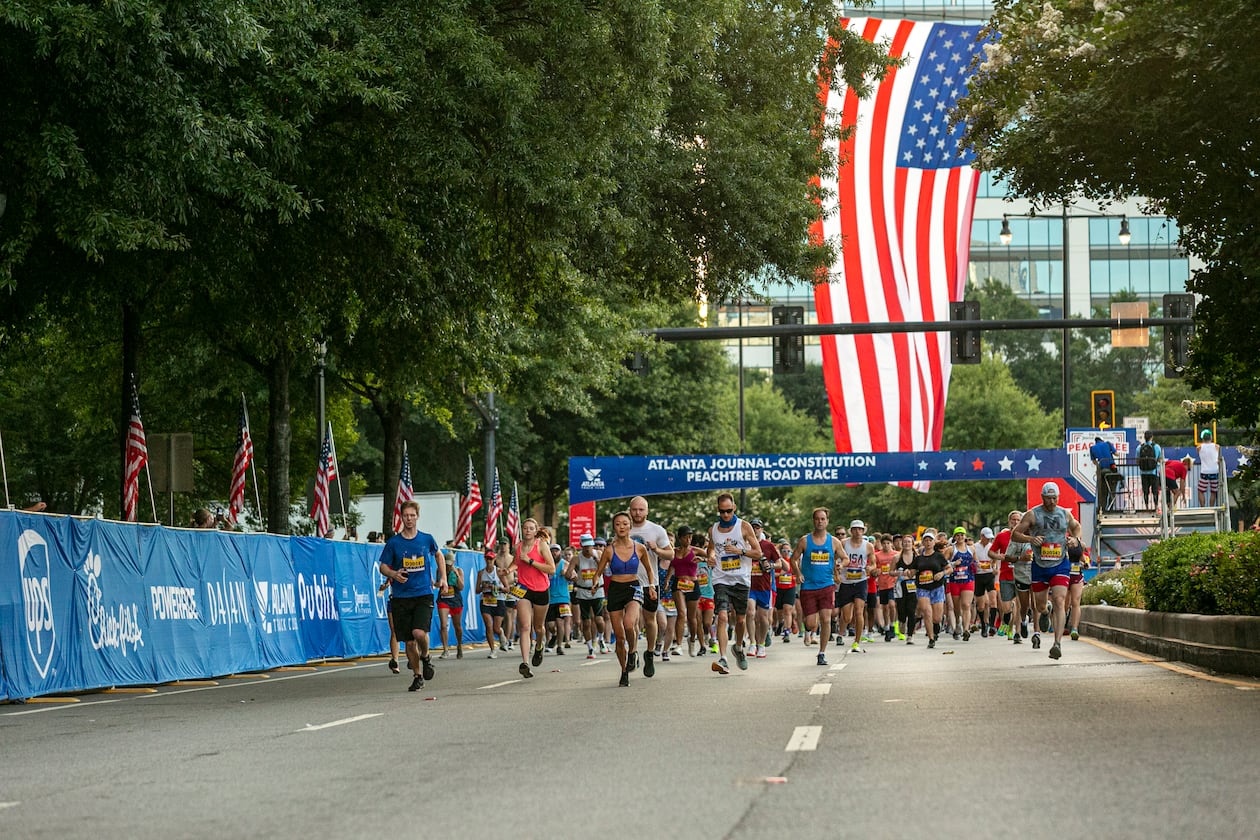 Runners take off at the start line of the AJC Peachtree Road Race, July 4, 2024. (Joaquin Lara for Atlanta Track Club)