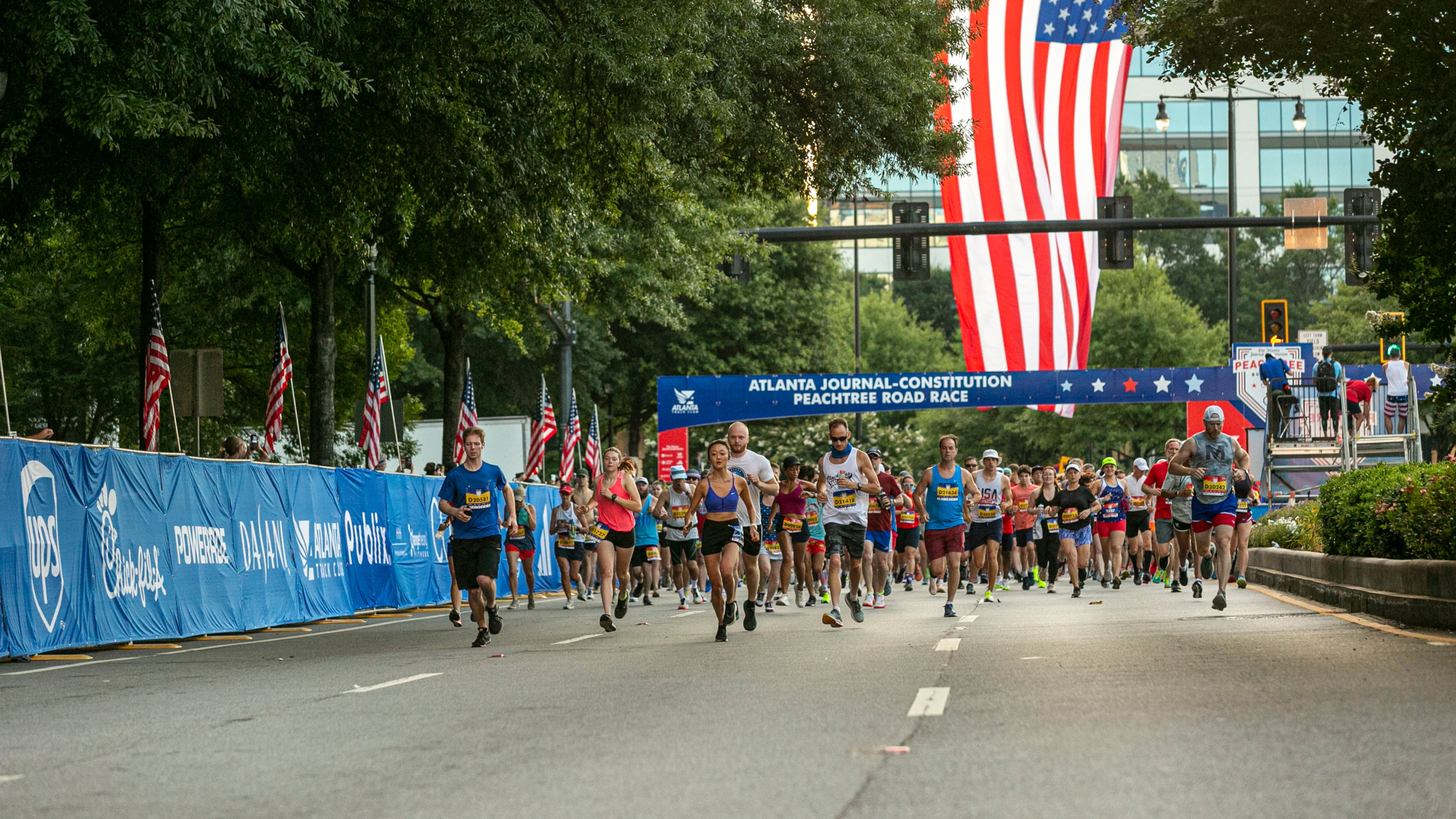 Runners take off at the start line of the AJC Peachtree Road Race, July 4, 2024. (Joaquin Lara for Atlanta Track Club)