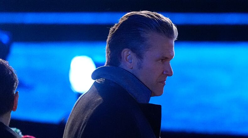 Defense Secretary Pete Hegseth arrives before the lighting of the National Christmas Tree on the Ellipse, Thursday, Dec. 4, 2025, near the White House in Washington. (AP Photo/Julia Demaree Nikhinson)