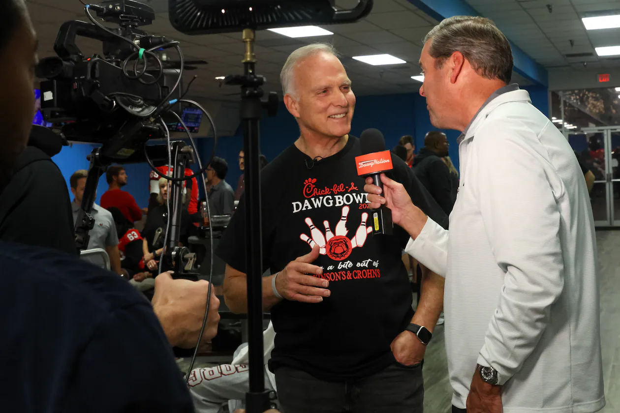 Former UGA football coach Mark Richt gives an interview during the third annual Chick-fil-A Dawg Bowl fundraiser for Parkinson’s and Crohn’s disease research at Showtime Bowl in Athens on Wednesday, Oct. 22, 2025. Richt, who was diagnosed with Parkinson’s disease in 2021, hosted the event. (C.J. Bartunek for the AJC)