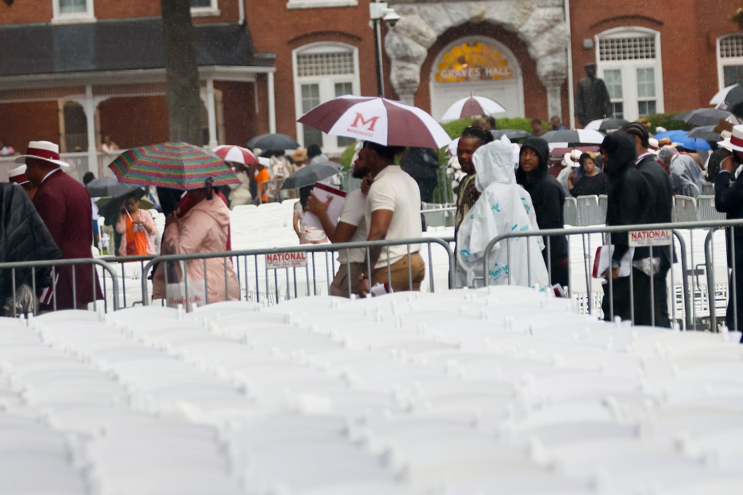 Crowds started moving out of the ceremony due to a thunderstorm in the area, and the ceremony was moved indoors at Morehouse College’s 141st Commencement Ceremony on Sunday, May 18, 2025.
(Miguel Martinez/ AJC)