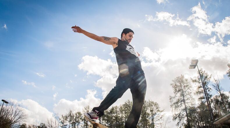 Nick Wheeler of Sandy Springs takes advantage of warm winter weather to skateboard at Brook Run Park in Dunwoody in this AJC file photo. (John Amis/Special)