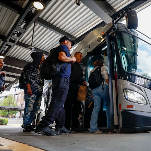 MARTA riders are seen getting on bus route 39 at the Lindbergh Center Station bus loop on Thursday, March 26, 2026. Every route in the system has been changed as part of a bus network redesign that's meant to bring more frequent and reliable service to more people. The new routes, which begin April 18, will cover less distance geographically but will run more frequently. (Miguel Martinez/AJC)