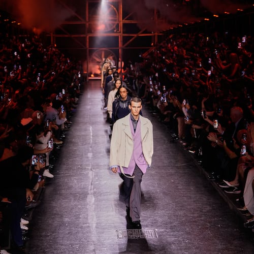 Models wear creations from Diesel's Spring-Summer 2027 collection presented in Milan, Italy, Tuesday, Sept. 22, 2026. (AP Photo/Luca Bruno)