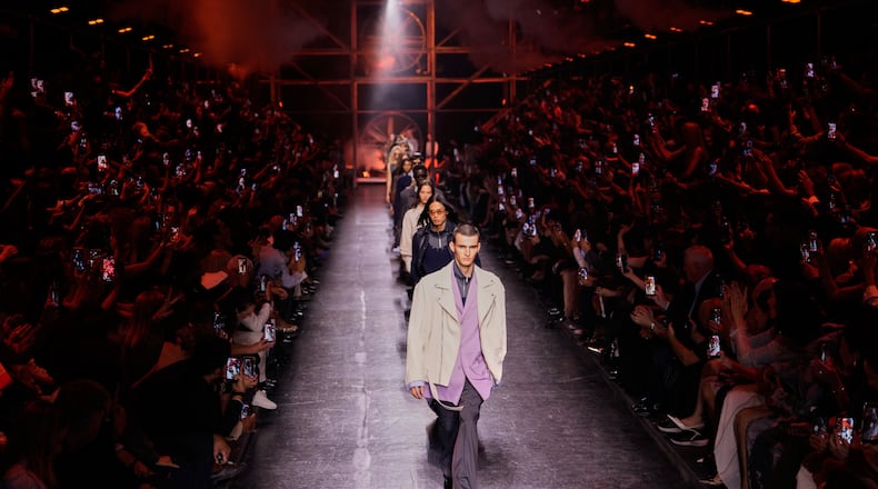 Models wear creations from Diesel's Spring-Summer 2027 collection presented in Milan, Italy, Tuesday, Sept. 22, 2026. (AP Photo/Luca Bruno)