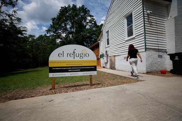 A person walks into El Refugio, a place that offers accommodation for immigrant families who come to see their relatives at the Stewart Detention Center in Lumpkin, April 27, 2025. It is open on the weekends. (Miguel Martinez/AJC)