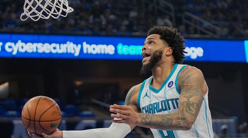 FILE - Charlotte Hornets forward Miles Bridges makes a shot against the Orlando Magic during the second half of an NBA play-in tournament basketball game, Friday, April 17, 2026, in Orlando, Fla. (AP Photo/John Raoux, file)