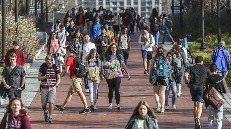 Georgia Tech students were on the move in between classes on campus on Wednesday, March 11, 2020, before the coronavirus pandemic. JOHN SPINK / JSPINK@AJC.COM