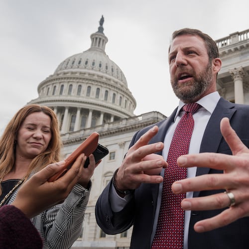 FILE - Sen. Markwayne Mullin, R-Okla., speaks with reporters on the steps at the Capitol in Washington, Thursday, March 5, 2026. (AP Photo/J. Scott Applewhite, File)
